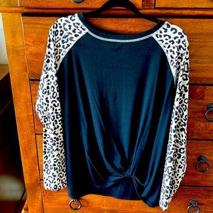 Leopard printed sleeves gently worn
